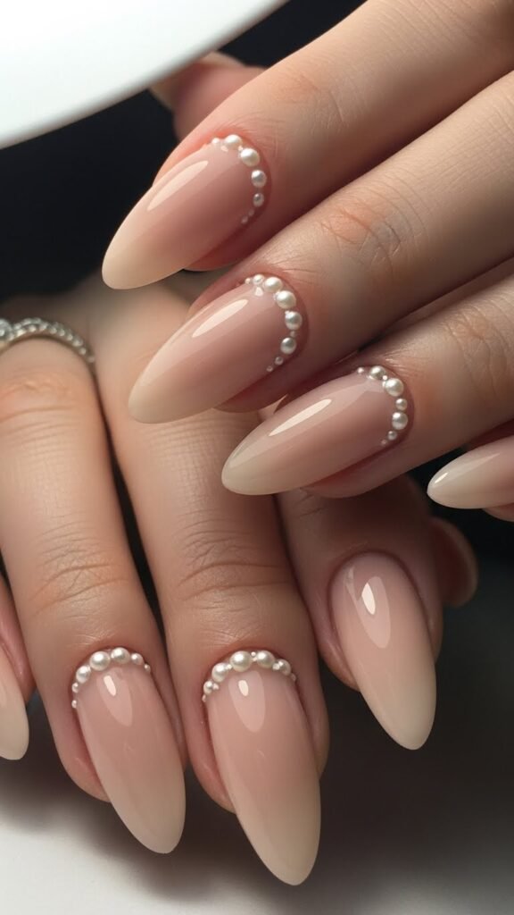 2. Nude Bridal Shower Nails with Pearl Accents