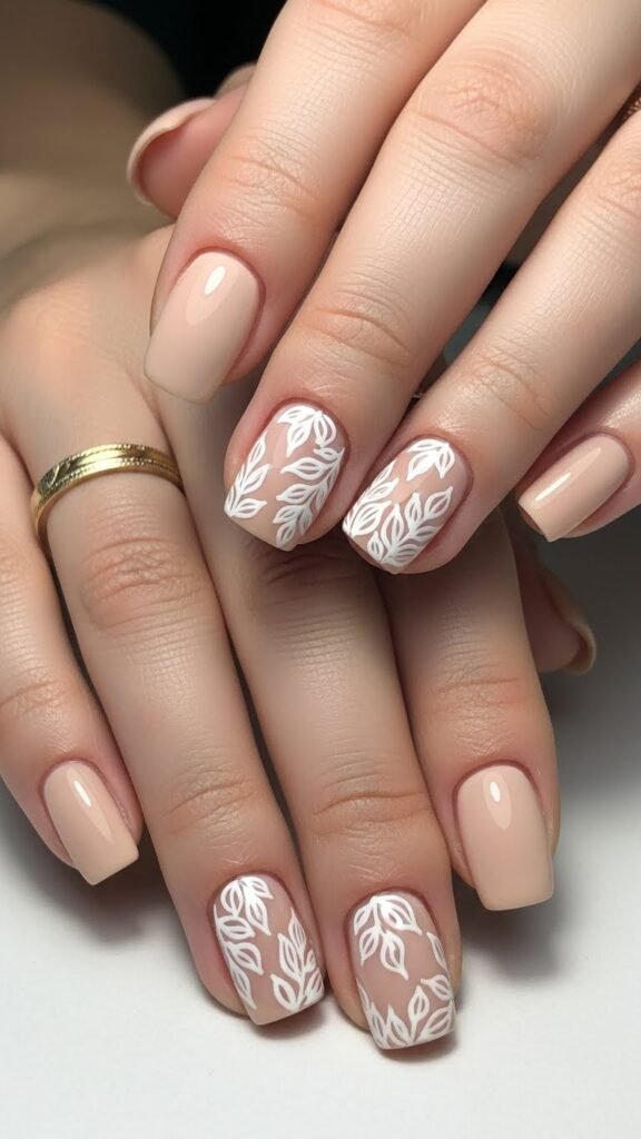 7. Beige With White Leaf Nail
