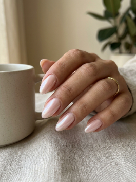 Floral spring nails are a beautiful way to bring a fresh and soft vibe to your look. This design usually features tiny hand-painted flowers on a nude or pastel base, making it feel delicate and feminine. You can go for daisies, roses, or abstract floral patterns depending on your style. These nails are perfect for spring events, casual outings, or even weddings. The best part is that floral designs can be customized easily—minimal flowers for a subtle look or full coverage for something bold. If you love nature-inspired beauty, this design adds a refreshing touch to your nails.