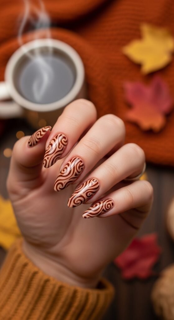 13. Beige and Brown Swirl Nails