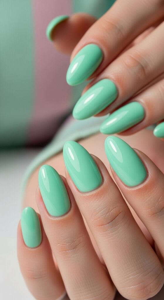 3. Mint Green Glossy Nails