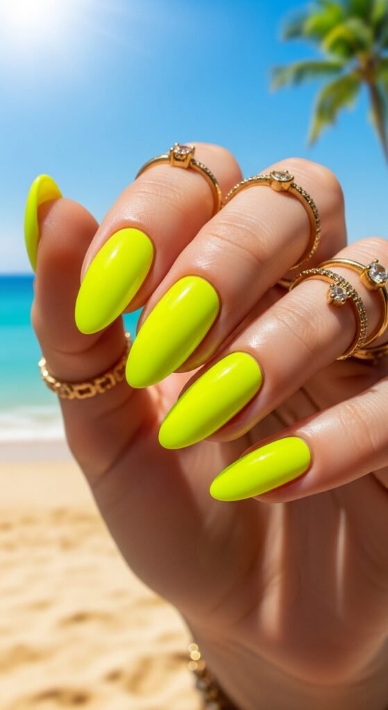 1. Classic Glossy Neon Yellow Nails