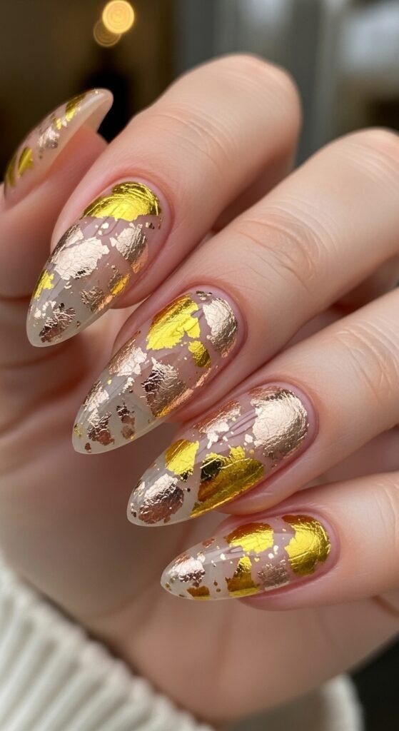 18. Gold Foil Accent Nails