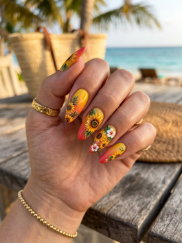 18. Orange and Sunflower Nails