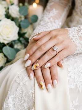 24. Elegant Sunflower Nail Art